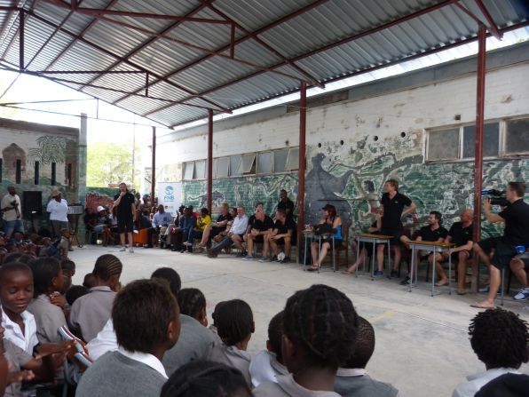 Children at a secondary school at in Okaukuejo, in Namibia's Etosha National Park, listen to advice on how to look after the environment and use their resources wisely.