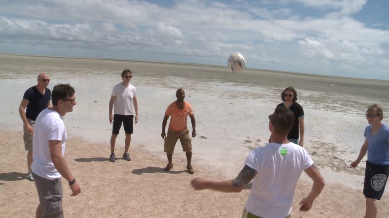 In what almost seems like an endless landscape, players take part in what is believed to be the first football match staged on the huge Etosha salt pan, which forms part of the Kalahari Basin in northern Namibia. "It felt like playing on the moon, but it was a very proud moment," Pfannenstiel says.