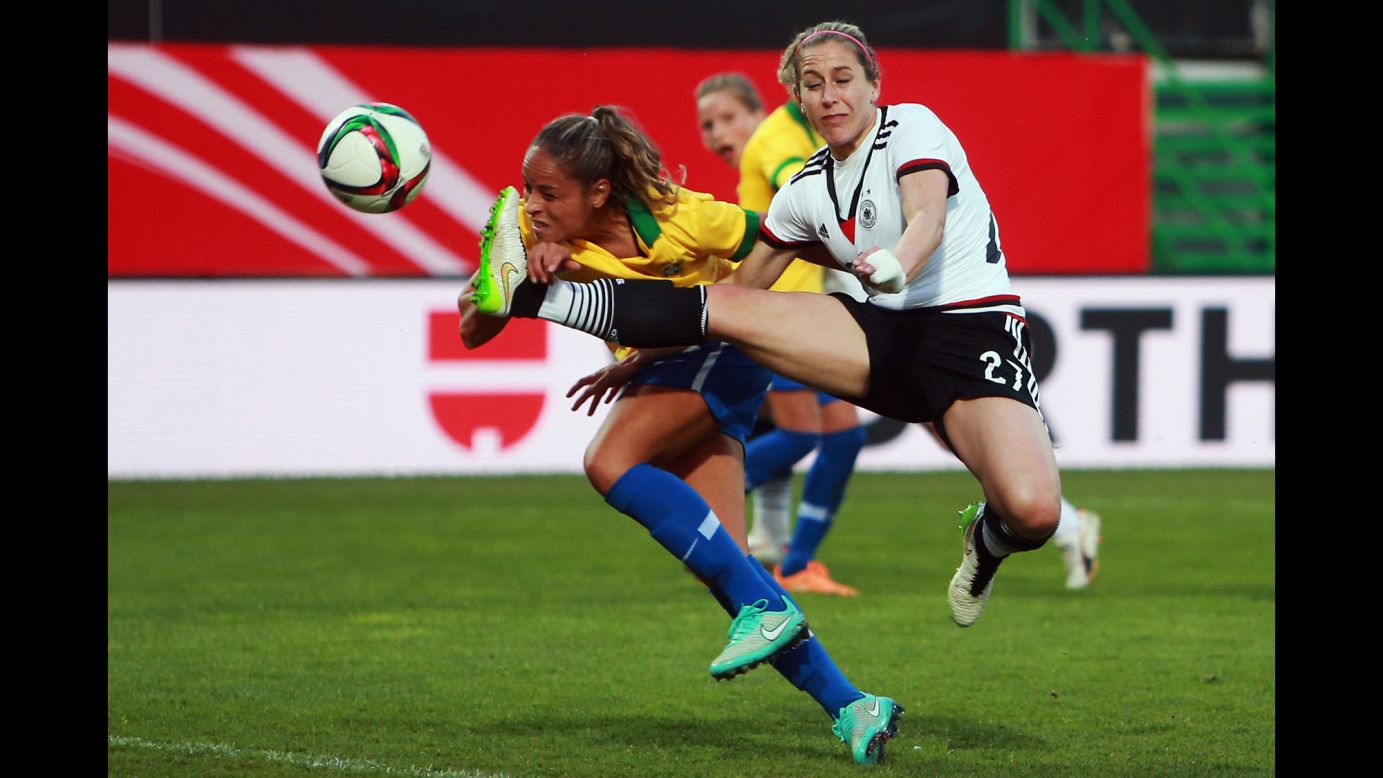 Germany's Anna Blasse, right, competes with Brazil's Monica during an international friendly played Wednesday, April 8, in Furth, Germany. Germany, the top-ranked team in the world, won the match 4-0.