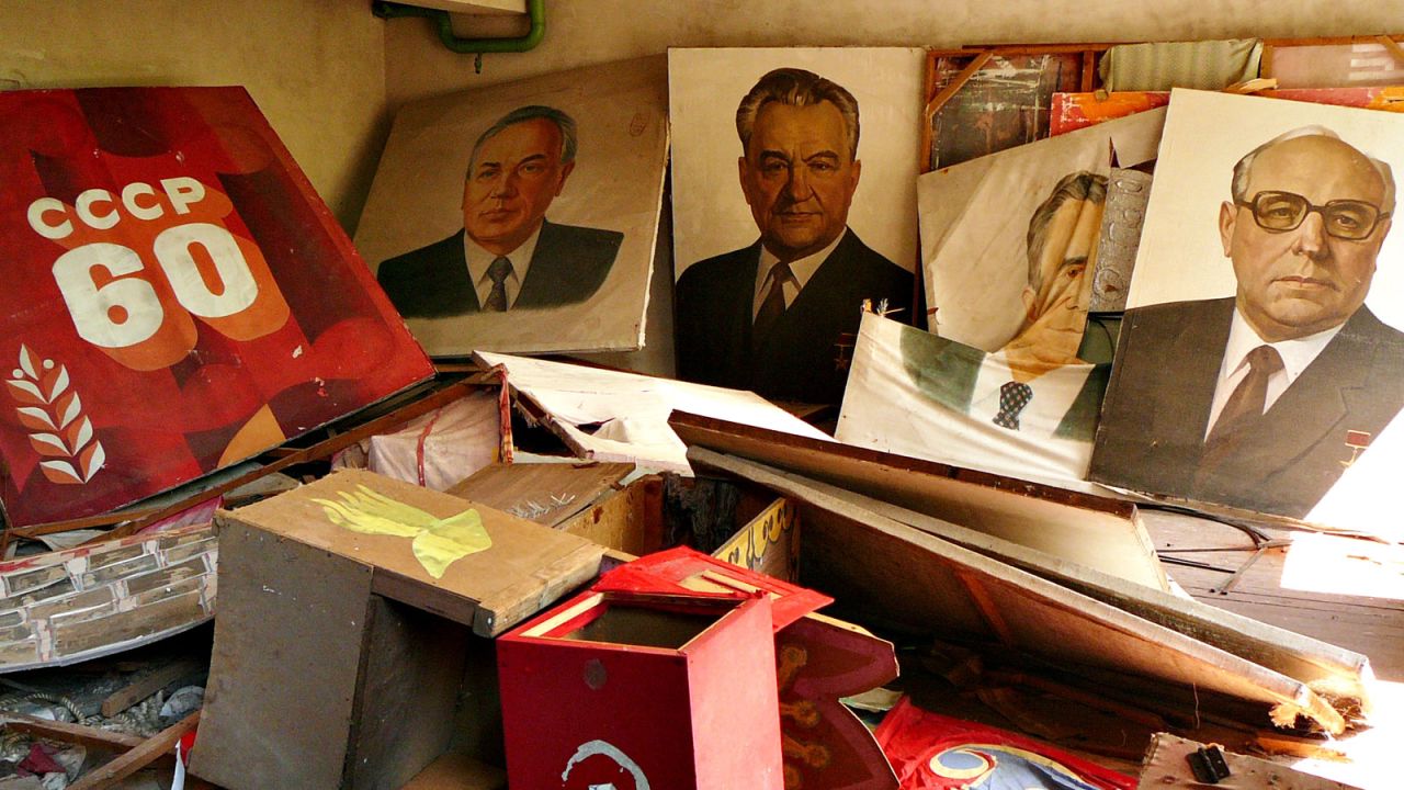 Soviet-era portraits, posters and a ballot box inside the abandoned Soviet city of Pripyat.