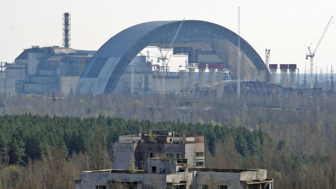 A new "safe containment" barrier is being built over the Chernobyl power plant to reinforce a sarcophagus structure originally constructed to limit the escape of radiation.