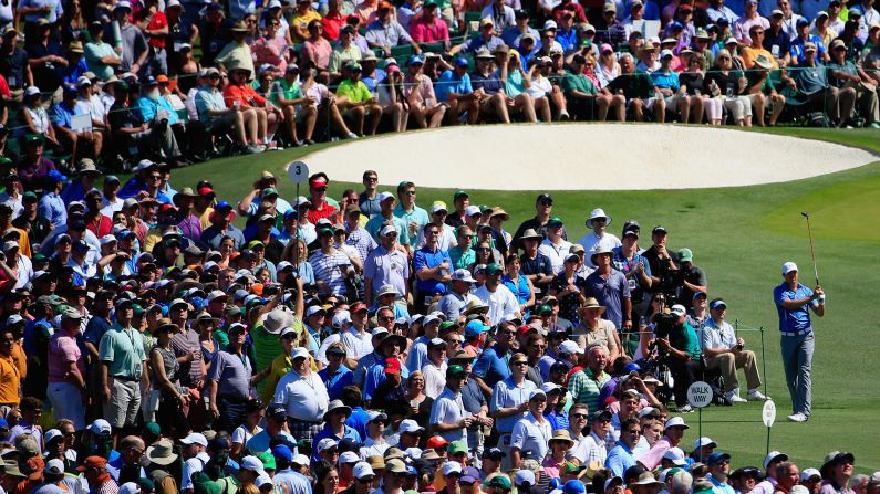 Jordan Spieth hits a tee shot during the third round of the Masters on Saturday, April 11. Spieth, 21, tied the tournament record on his way to winning the green jacket and his first major title. He led after all four rounds and finished 18 under par, tying Tiger Woods -- who was also 21 when he set the record in 1997.