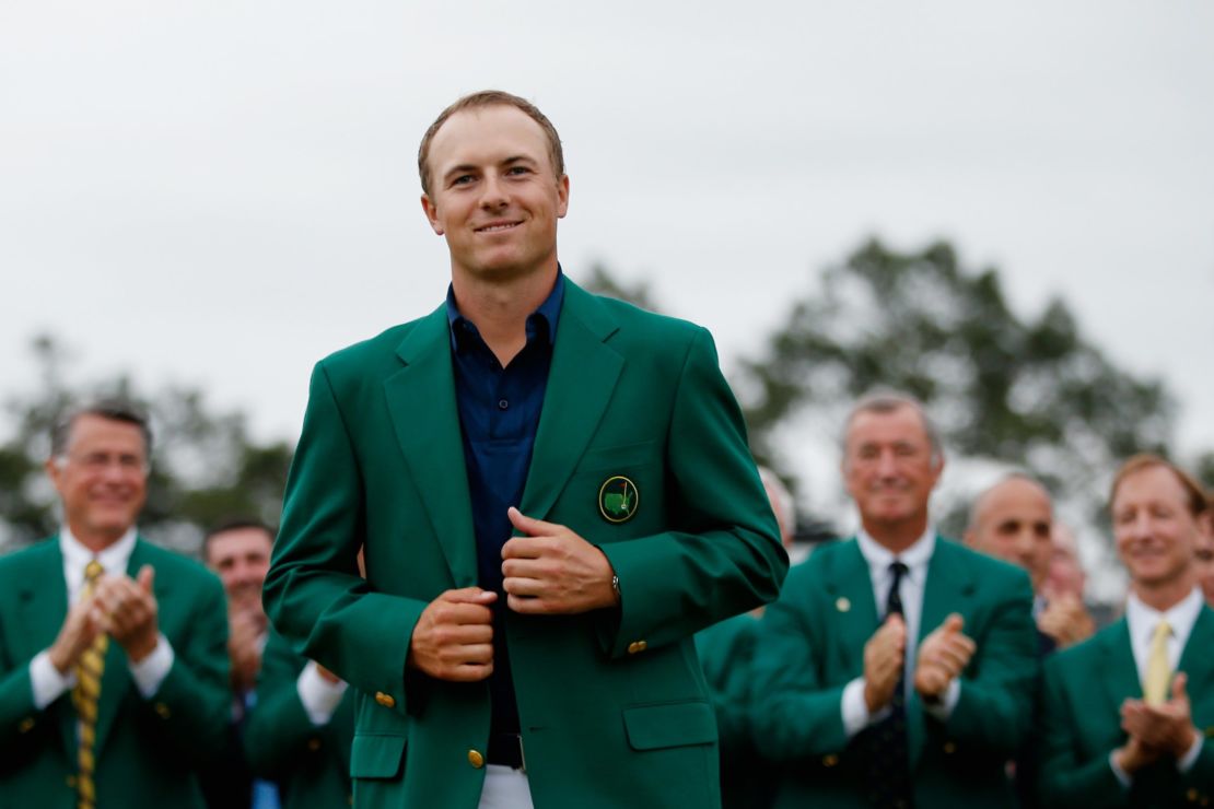 Spieth settles into his green jacket after victory in 2015.