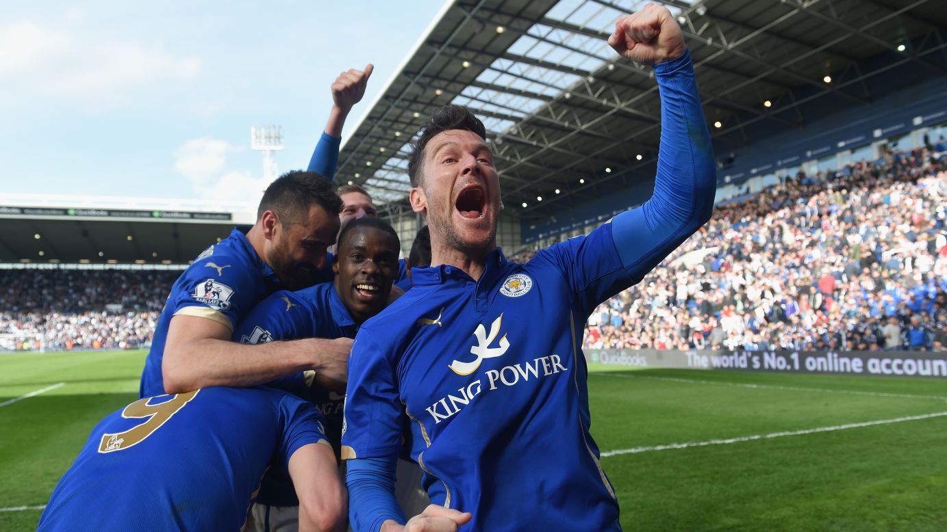 Leicester City players celebrate after a late goal lifted them to a 3-2 victory over West Bromwich Albion during a Premier League match played Saturday, April 11, in West Bromwich, England.