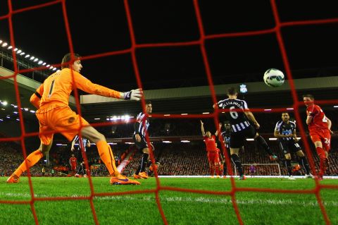 Newcastle goalkeeper Tim Krul is helpless as Joe Allen scores Liverpool's second goal in the 70th minute. 