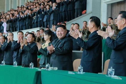 KCNA provided a list of officials who watched the match. They included Choe Ryong Hae, Choe Thae Bok, Kim Yang Gon, Kwak Pom Gi, Kim Phyong Hae and members of the State Physical Culture and Sports Guidance Commission. Youth, students and "working citizens" also watched from the stands.