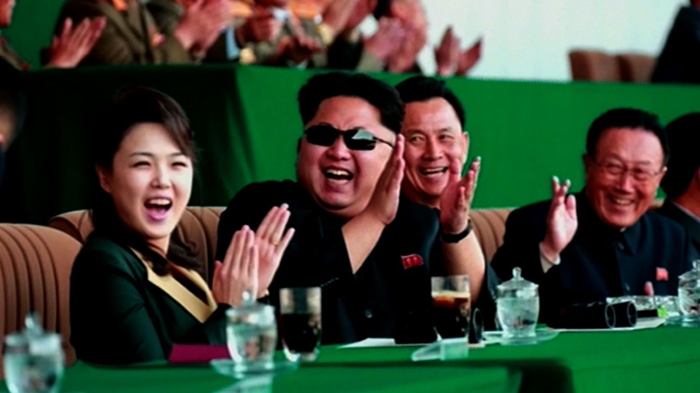 A jovial Kim Jong Un is seen clapping at a soccer match, alongside his wife Ri Sol Ju. It's the first time North Korea's first lady has been seen in public since December, 2014. It's unclear what they were cheering; it may have been the game, or a display of model gliders provided by the Pyongyang Air Club during half-time.