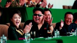 North Korean leader Kim Jong Un at a soccer match with his wife Ri Sol Ju.