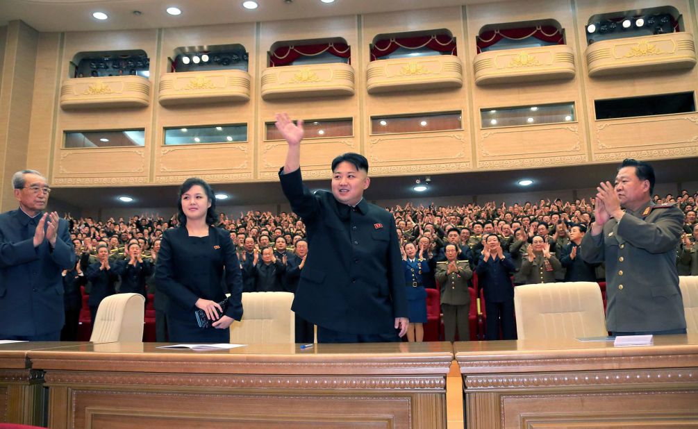 Ri was also seen by her husband's side in an image released in May, 2013, at a performance by the Song and Dance Ensemble of the Korean People's Internal Security Forces in Pyongyang. 