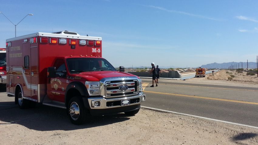 Authorities work a perimeter near a canal in Yuma, Arizona, on April 11, 2015.