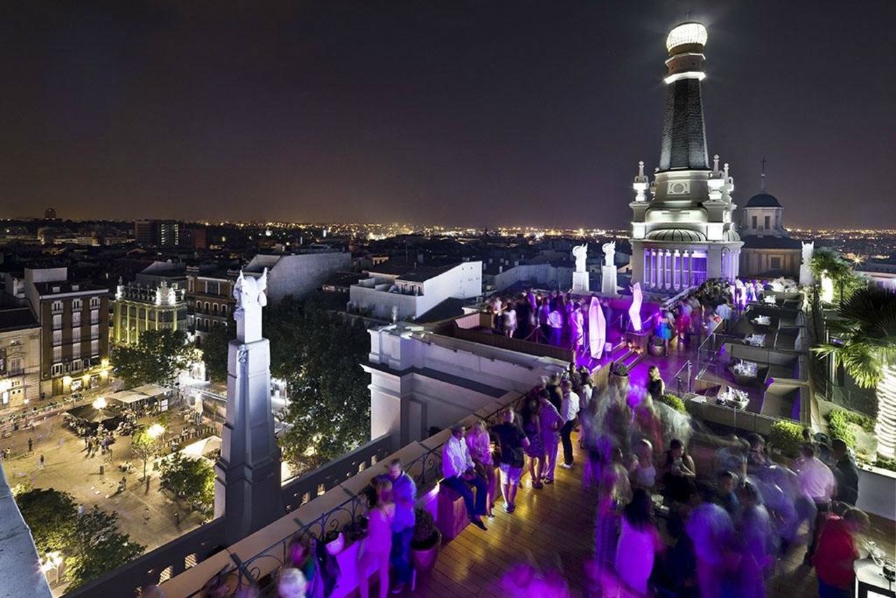 Carved into a broken stone wall, decked out in leather and metal and illuminated by purple mood lighting, this bar feels sort of Vegas -- but with sweeping views over Spain's capital. 