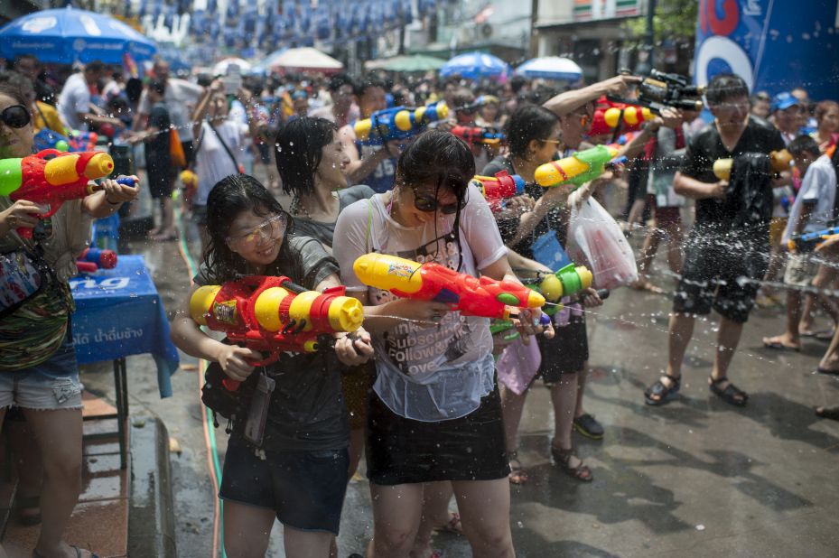 Revelers take part in a street battle during the Songkran festival on Khao San Road on April 13, 2015 in Bangkok, Thailand. Often referred to as the world's biggest water fight, the Songkran festival marks the traditional Thai New Year. 