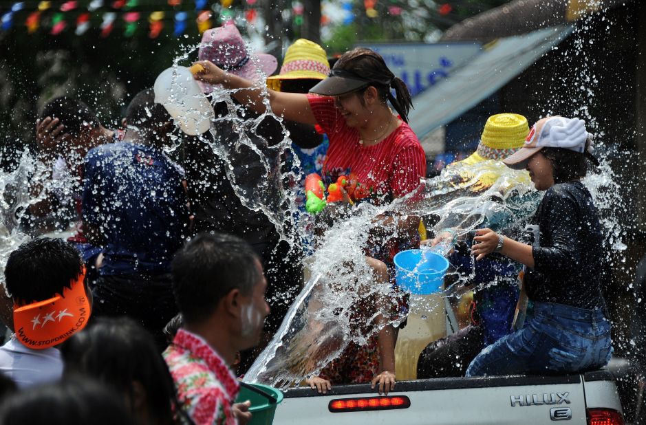 Revelers take part in water fights in Thailand's southern province of Narathiwat on April 13, 2015.   