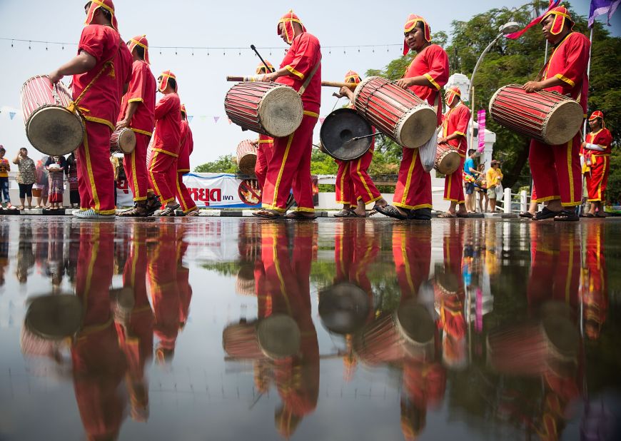 Songkran isn't just about splashing. Cultural activities such as parades and concerts are also held throughout the country to celebrate the Thai New Year. Here, Thai performers take part in a Songkran parade in Chiang Mai, Thailand.