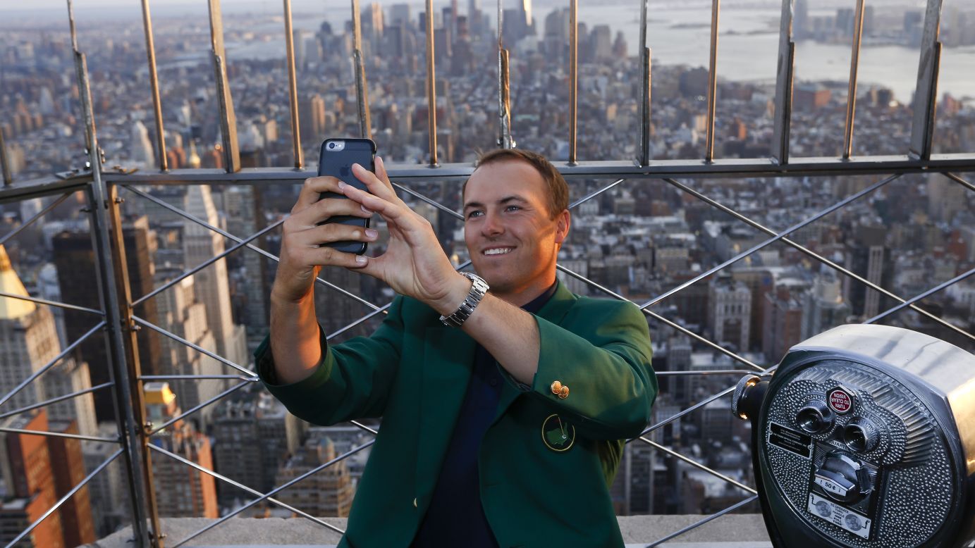 Pro golfer Jordan Spieth, the newest Masters champion, visits the observation deck at New York's Empire State Building on Monday, April 13. Spieth, 21, tied the tournament record this weekend on his way to winning his first major title.
