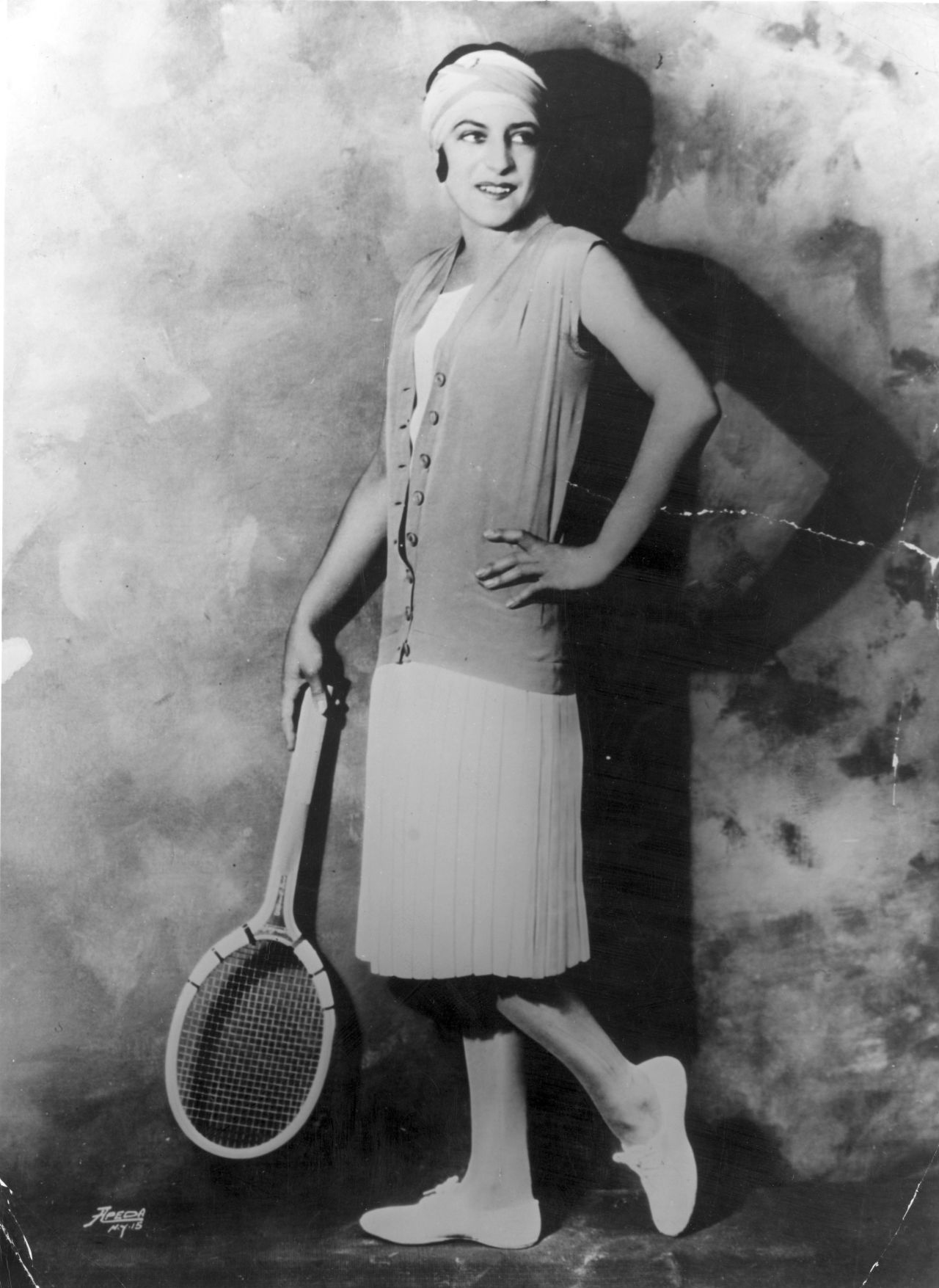 One of the most controversial players of the 1920s was chic French star Suzanne Lenglen (pictured in 1925).<br />"She was scandalous in many different ways; sometimes sipping brandy in the changeovers," says Rothenberg.<br />"Suzanne really was a tennis icon who had a lot of influence on general fashion. Even the head wraps she'd wear to keep the hair out of her eyes became a fixture of 1920s fashion for women around Europe and the U.S."