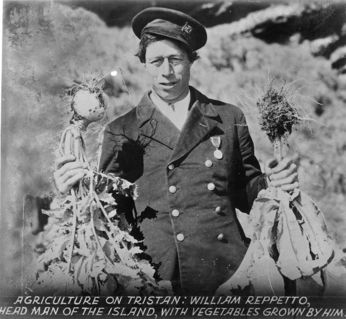 William Reppetto, head man on Tristan da Cunha, holding home-grown vegetables in 1937.