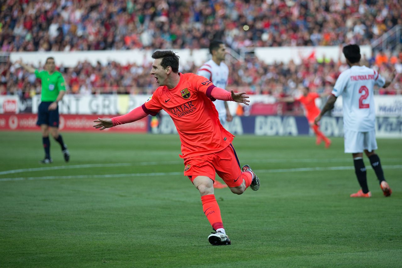 Messi scores Barcelona's opening goal of the 2-2 draw at Sevilla. He now has 35 goals in La Liga this season and 46 overall.