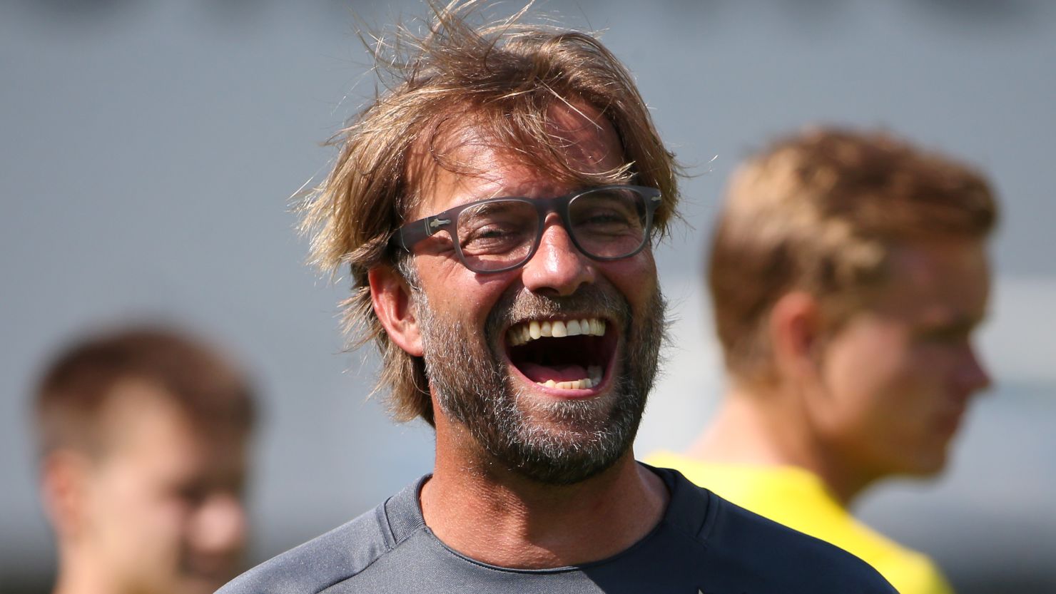Klopp laughs during a training session in a Borussia Dortmund training camp in July 2014.