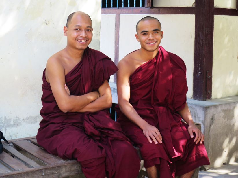 Ashin Pannadhaya (left) and Ashin Zavana (right) hope tourists will respect their lunch hour. 