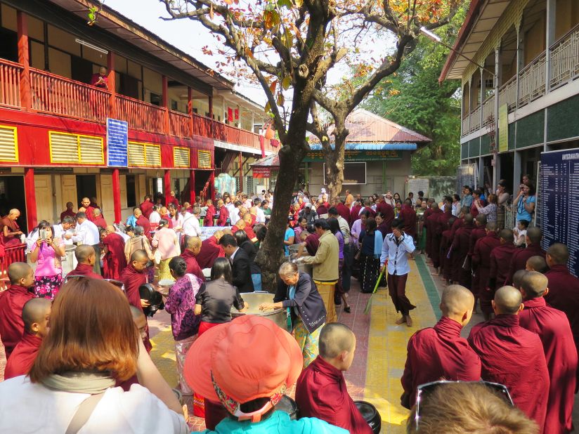 Tourists come to see the monks lining up and eating lunch at the unusually early hour. The monks aren't allowed to eat from noon until breakfast time the next day.