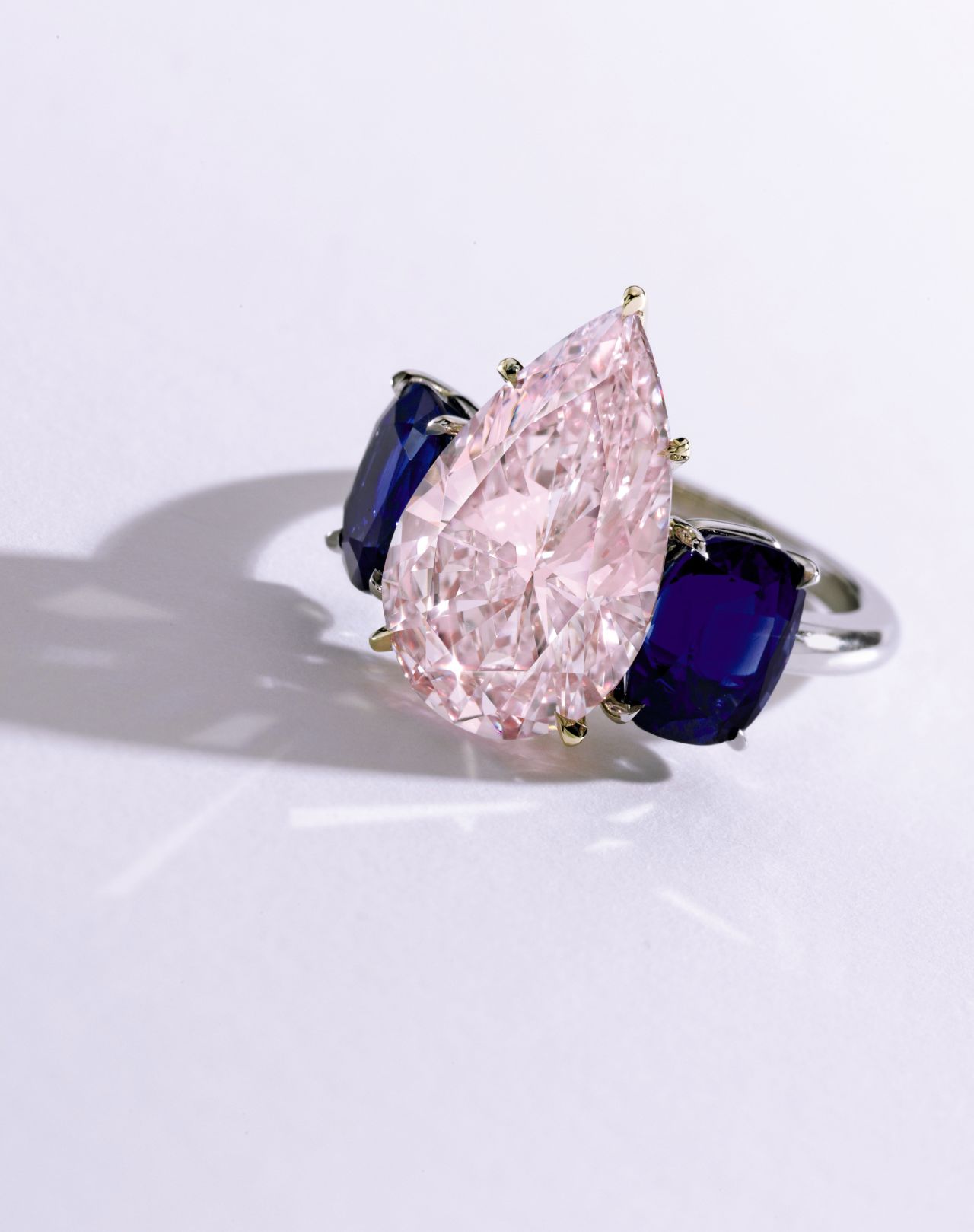 This purple-pink diamond, set between two sapphires, provides a great alternative to the classic white. It sold for $2.4 million.
