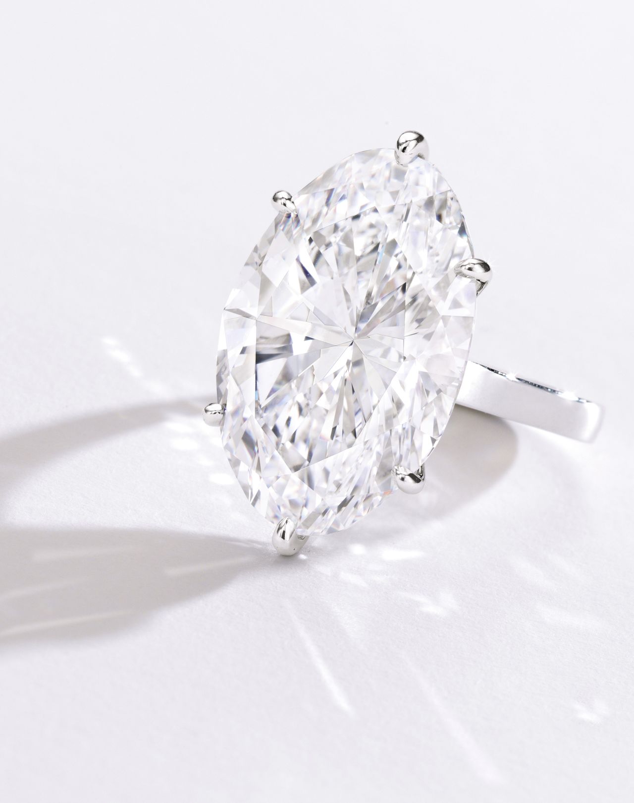 This oval-shaped 22.30 carat diamond ring sold to an online bidder for $3.3 million.