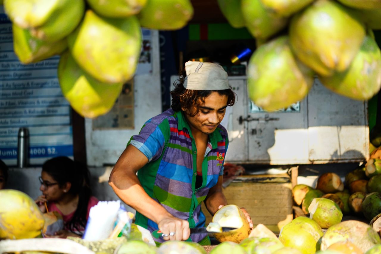 A coconut vendor prepares for customers on a warm spring afternoon. <a href="http://ireport.cnn.com/docs/DOC-1229961">Bijoy Mishra</a> travels frequently to India and enjoys taking photographs of the livelihood of the locals in Mumbai. 