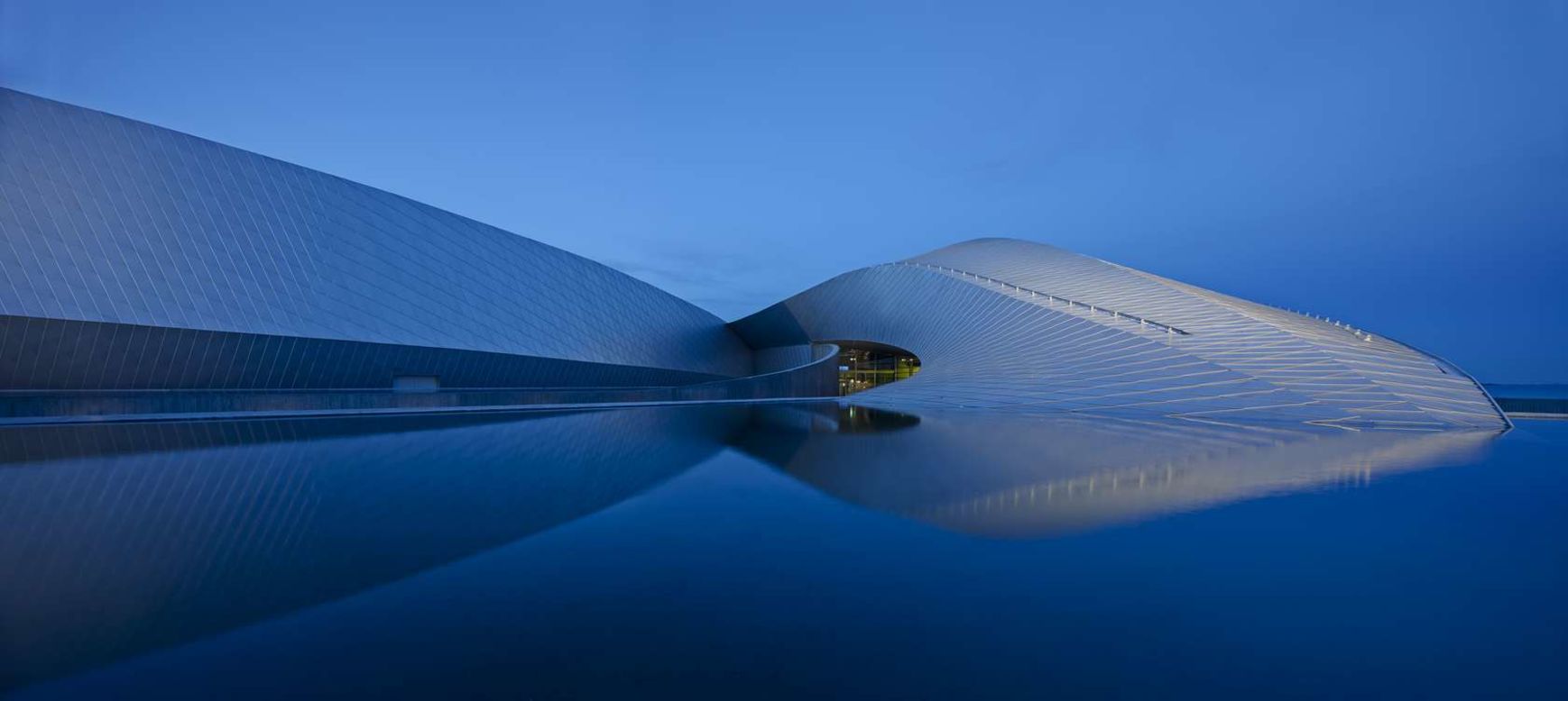Designed by 3XN, this stunning aquarium was Inspired by the shape of natural whirlpools, water streams, shoals of fish and flocks of birds. It was completed in 2013. 