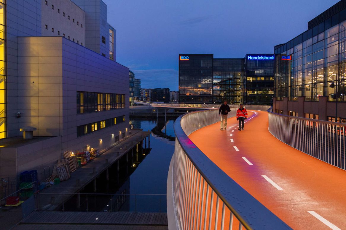 Dissing+Weitling is the architecture firm behind Copenhagen's cool new "Bicycle Snake." The 190-meter-long orange bridge and 30-meter ramp were designed to replace a nearby staircase -- a time-consuming obstacle for the 12,500 cyclists that pass through the area daily.