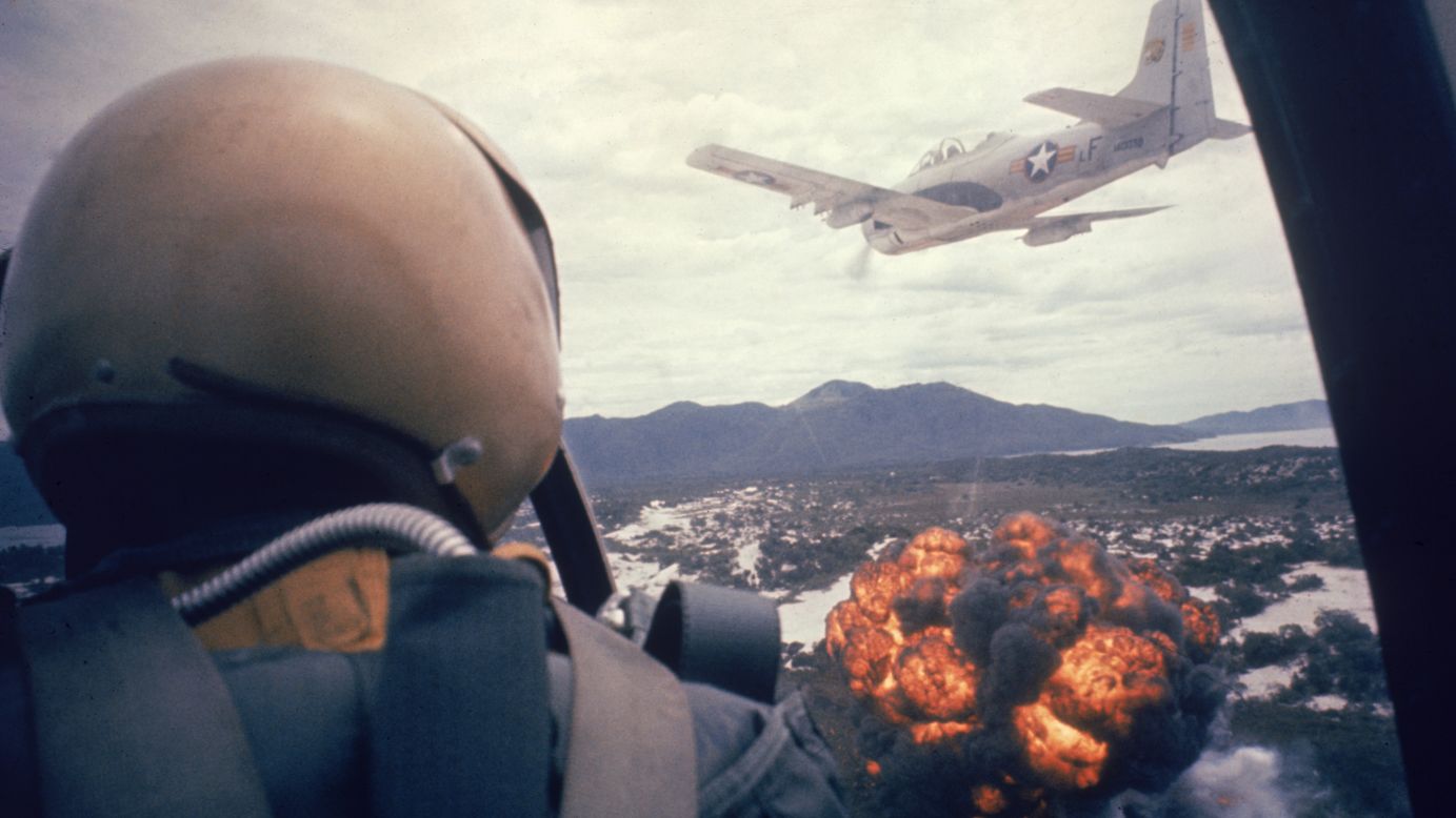 American planes drop napalm on Viet Cong positions in 1962. Hoping to stop the spread of communism in Southeast Asia, the U.S. also sent aid and military advisers to help the South Vietnamese government. The number of U.S. military advisers in Vietnam grew from 900 in 1960 to 11,000 in 1962.