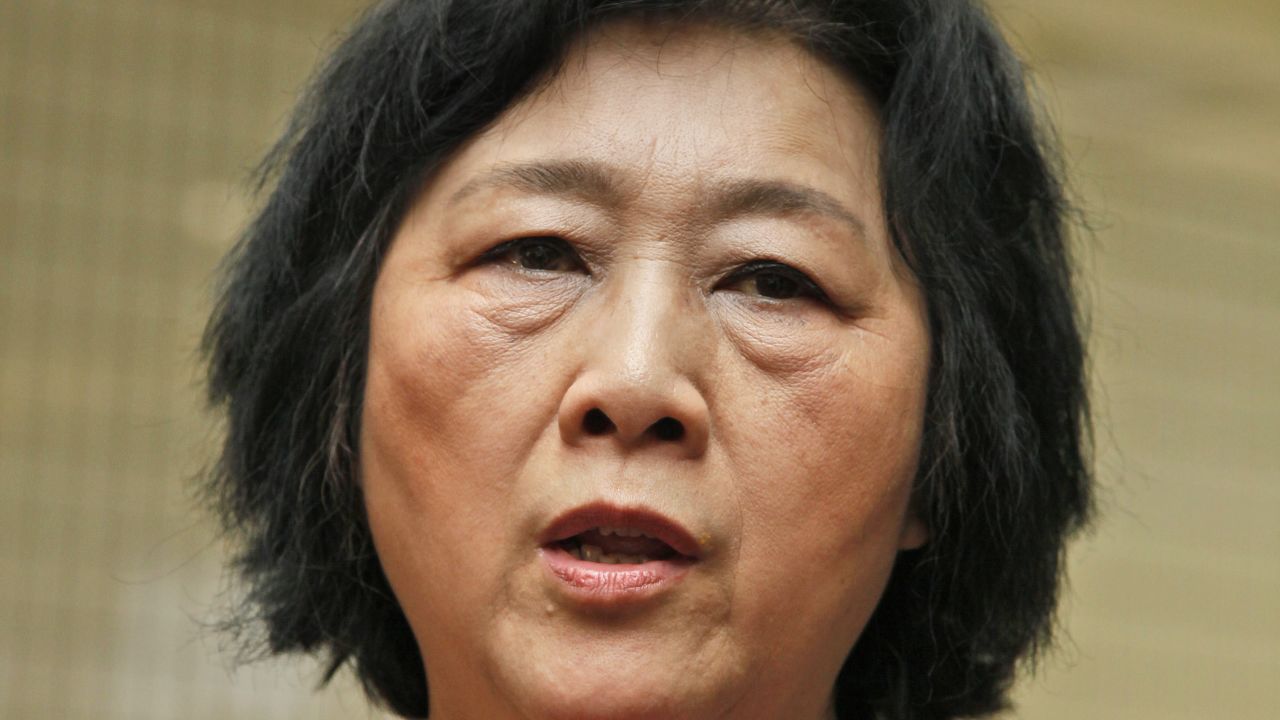 In this June 9, 2012 file photo, Chinese journalist Gao Yu attends an opening ceremony of Chinese artist Liu Xia's photo exhibition in Hong Kong. A court in Beijing on Friday, April 17, 2015 sentenced Gao to seven years in prison for leaking a top Communist Party policy document, the latest step in what is seen as a widening clampdown on free speech and civil liberties. (AP Photo/Kin Cheung, File)