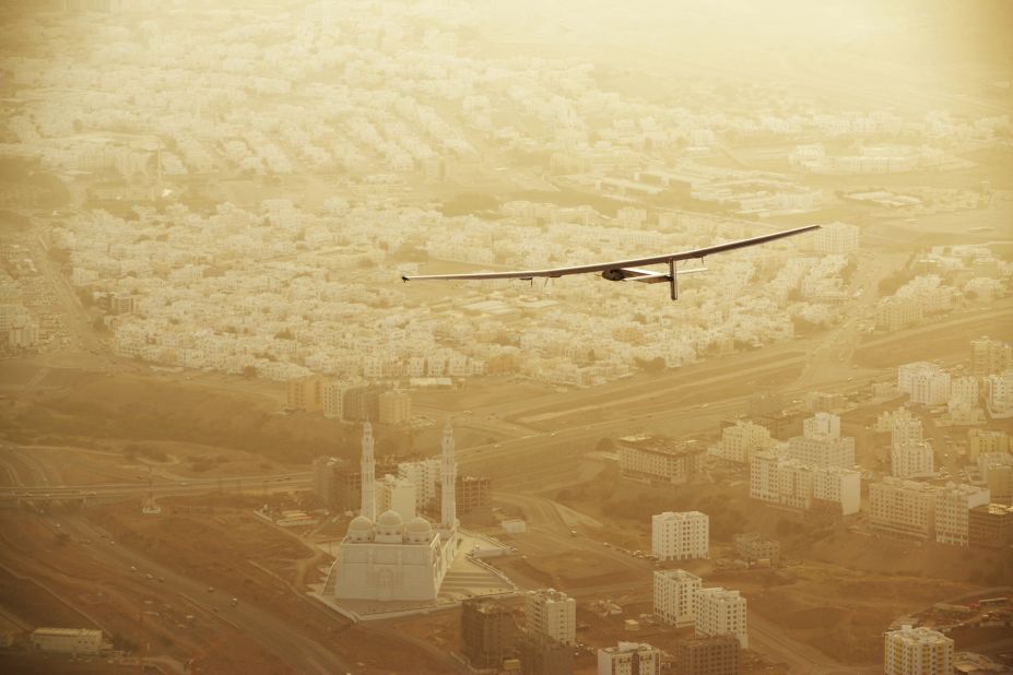 The Solar Impulse 2 flies over Muscat, Oman, after taking off on Tuesday, March 10.