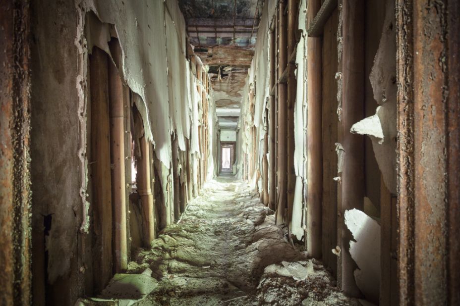 Walls reduced to a pulp in a hallway of the nurses' residence. The most notable resident of North Brother Island was "Typhoid Mary" Mallon, identified as the first asymptomatic carrier of typhoid fever in 1907.
