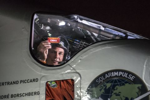 Piccard sits in the cockpit right after landing in Chongqing, China, on Sunday, March 31. He had just completed the fifth leg of the global trip.