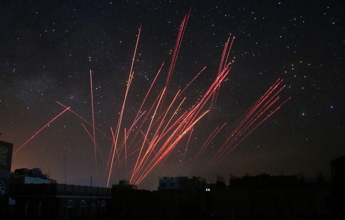 The sky over Sanaa, Yemen, is illuminated by anti-aircraft fire during a Saudi-led airstrike on Friday, April 17. The coalition's warplanes have been carrying out strikes against Houthi rebels since President Abdu Rabu Mansour Hadi fled the country in late March.