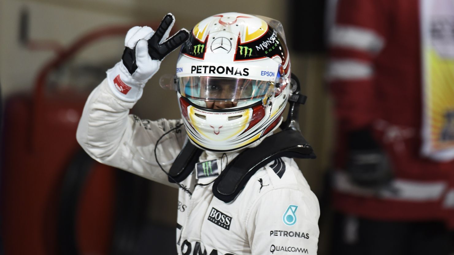 Lewis Hamilton celebrates after claiming poll at the Bahrain Grand Prix.