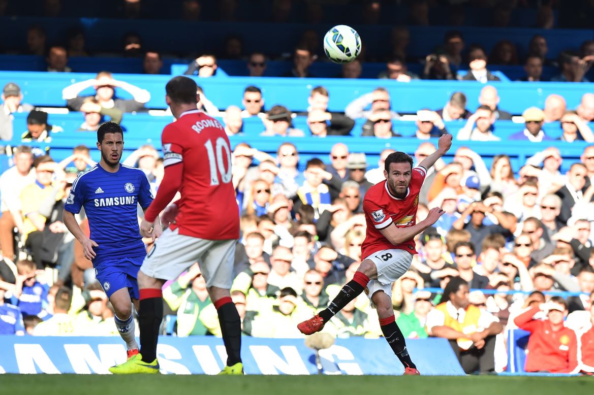 Juan Mata drives a cross into the Chelsea box as United look for a way back into the game.