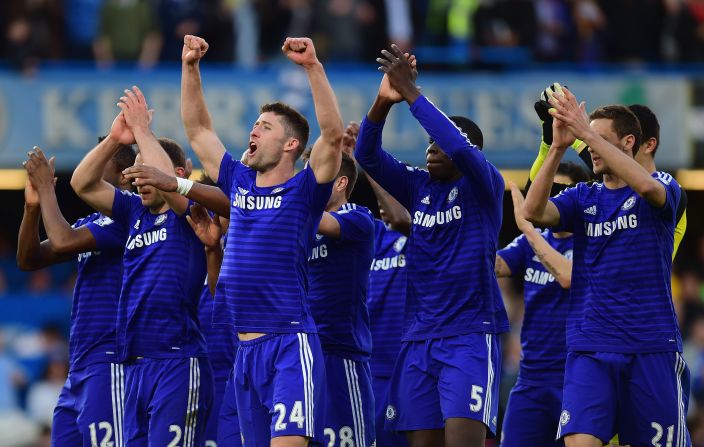 Chelsea players celebrate after the crucial 1-0 home win over Manchester Utd which left them with one hand on the EPL trophy.