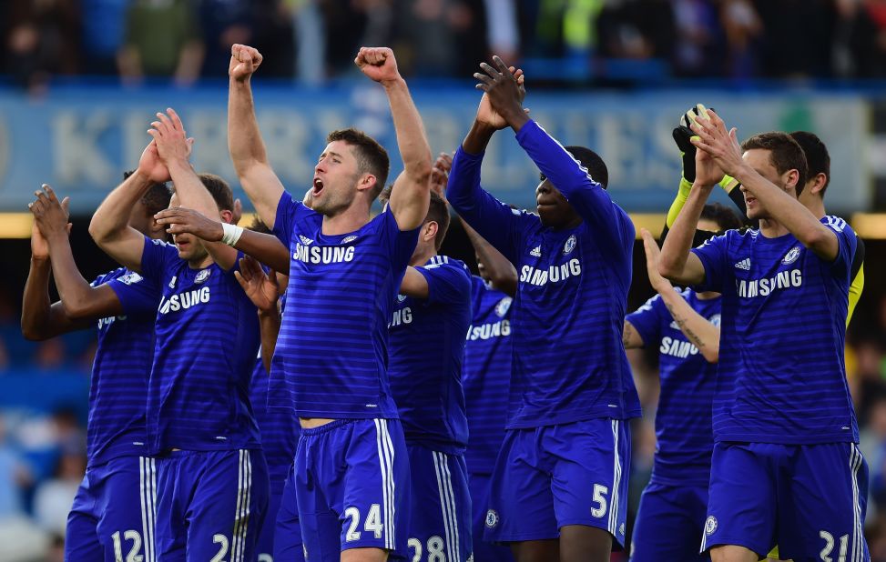 Chelsea players celebrate after the crucial 1-0 home win over Manchester Utd which left them with one hand on the EPL trophy.