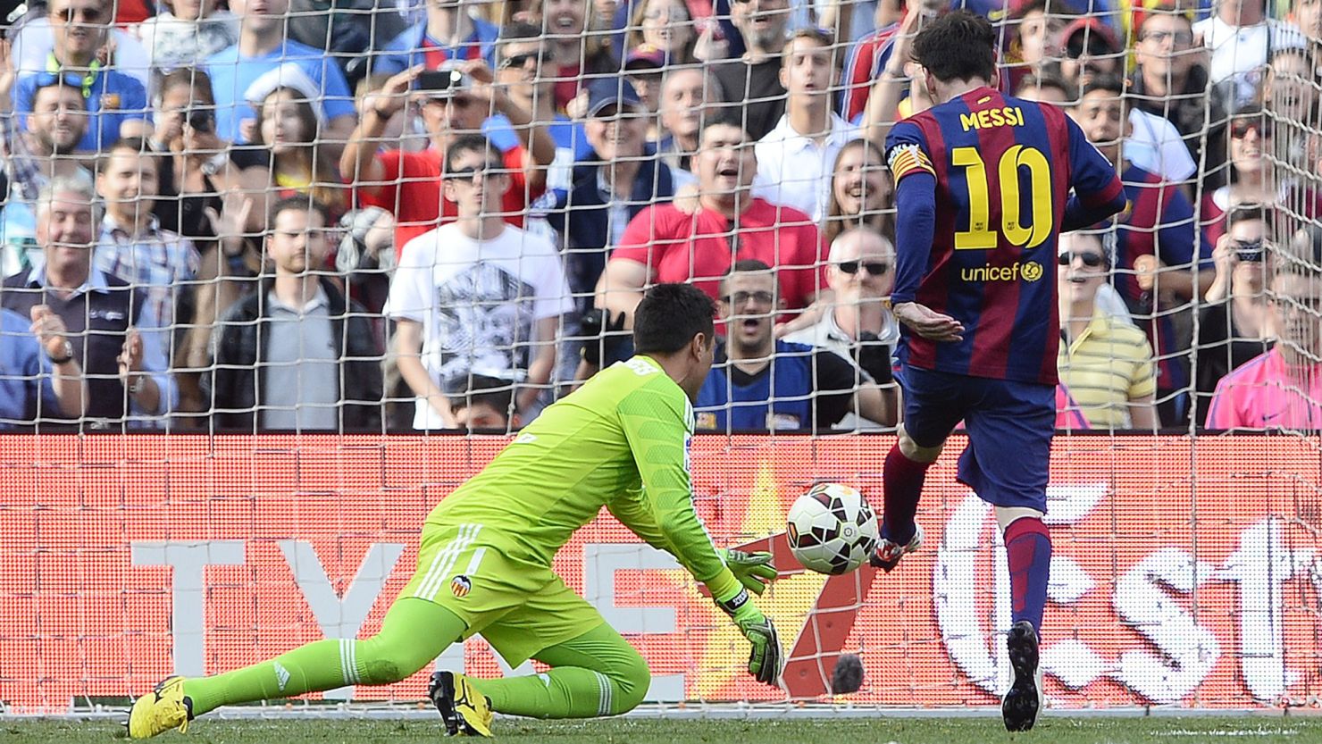 Lionel Messi scores his 400th goal for Barcelona in his sides 2-0 victory over Valencia.
