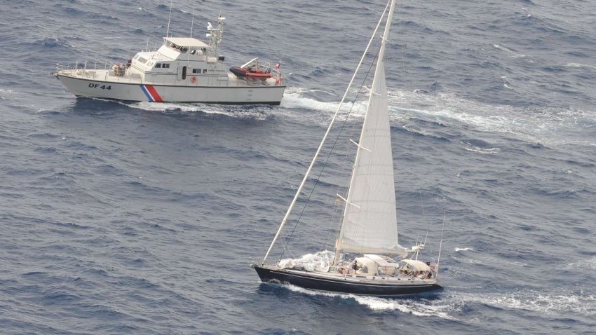 A handout photo taken on April 16, 2015 by the French customs off the French Caribbean island of Martinique, and released on April 18, shows the Silandra sailboat (C) carrying cocaine escorted to Fort-de-France by two customs vessels after the boat's interception on April 15 in the night. French finance minister Michel Sapin announced on April 18 a record seizure on the boat of 2.25 tonnes of cocaine, worth 70 millions of euros. Three Spanish nationals and a Venezuelan national were arrested on the boat. AFP PHOTO/DOUANE FRANCAISE-/AFP/Getty Images
