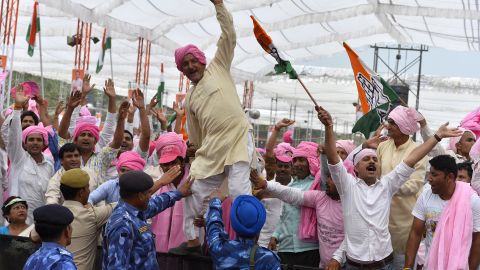 Indian Congress Party supporters shout slogans during a rally against a new land bill in Delhi on April 19, 2015.