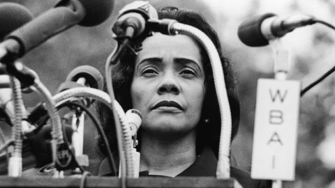 American civil rights campaigner, and widow of Dr. Martin Luther King Jr., Coretta Scott King (1927 - 2006) stands behind a podium covered in microphones at Peace-In-Vietnam Rally, Central Park, New York, April 27, 1968. 