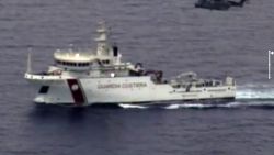 In this video grab released by the Italian Coast Guards (Guardia Costiera) on April 19, 2015 an helicopter and a ship take part in a rescue operation off the coast of Sicily following a shipwreck last night. Rescuers at the scene of a Mediterranean shipwreck feared to have claimed 700 lives are searching for survivors amongst corpses floating in the water, Malta's Prime Minister Joseph Muscat said. Italy's coastguard said 28 people were known so far to have survived the overnight capsize of a packed fishing boat that was attempting to smuggle hundreds of migrants from Libya to Italy. The coastguard said 24 bodies had been recovered so far.
AFP PHOTO / HO
= RESTRICTED TO EDITORIAL USE - MANDATORY CREDIT "AFP PHOTO / GUARDIA COSTIERA" - NO MARKETING NO ADVERTISING CAMPAIGNS - DISTRIBUTED AS A SERVICE T