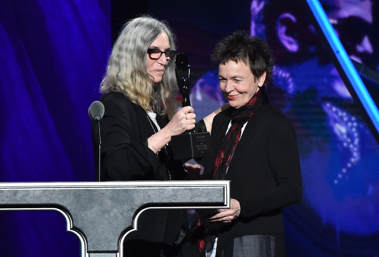 Laurie Anderson, right, accepted the award on behalf of inductee rocker Lou Reed, who died in 2013.