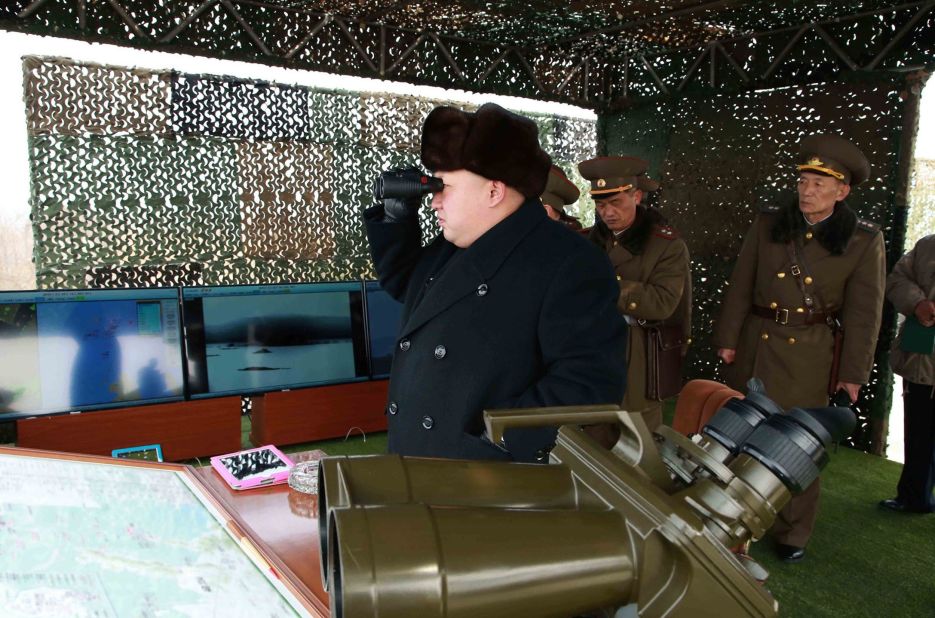 Kim inspects a drill for seizing an island at an undisclosed location in North Korea in an undated picture released by North Korea's official Korean Central News Agency on February 21.