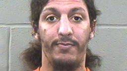 This police mug shot shows 28-year-old alleged shoe bomber Richard Reid after his arrest December 24, 2001 in Plymouth, Massachusetts. Reid plead guilty October 4, 2002, in Boston, Massachusetts to all eight counts levied against him on charges relating to his attempt to ignite explosives in his shoes while aboard American Airlines flight 63. (Photo Courtesy of Plymouth County Jail/Getty Images) 