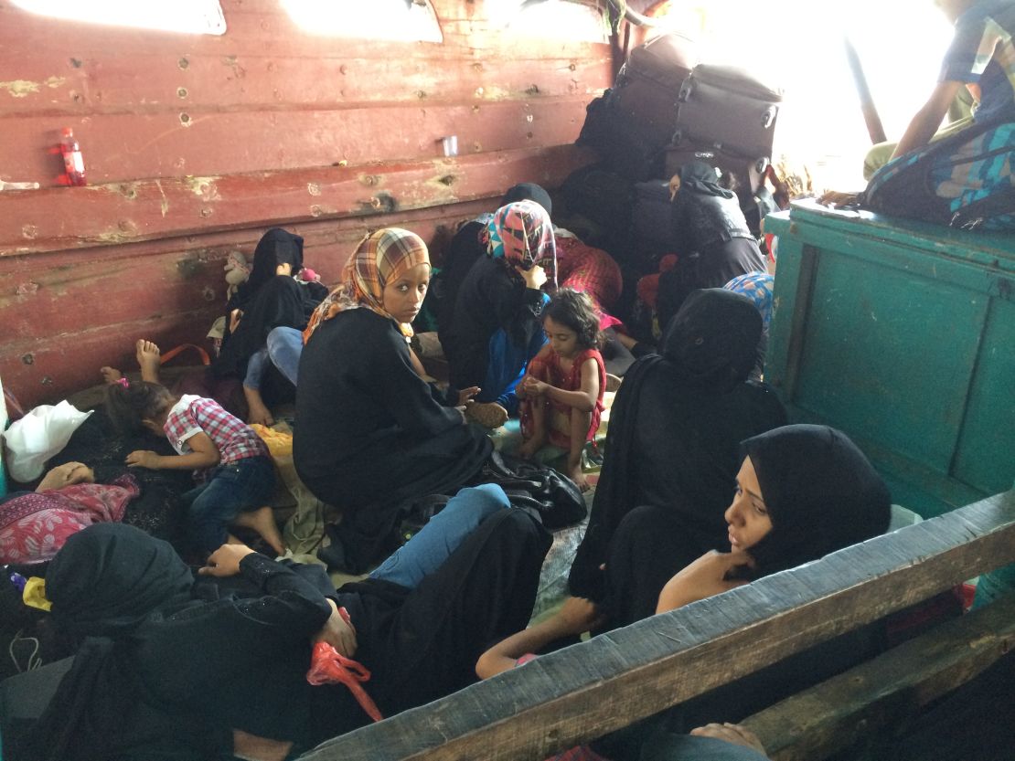 Hanna sits with a group of women on a ship carrying U.S. citizens out of Aden amid fighting.