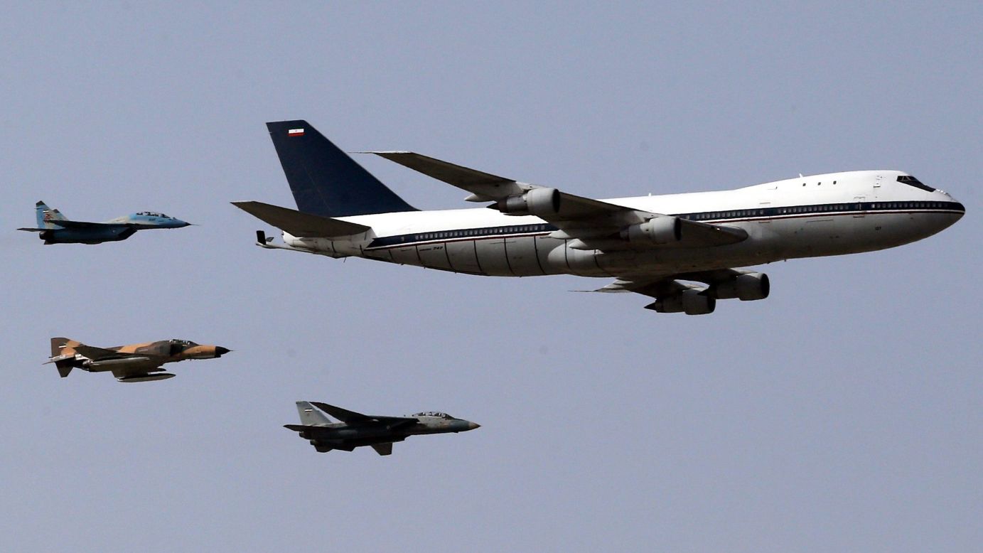 Iranian air force jets -- a MiG-29, from left, an F-4 Phantom and an F-14 Tomcat -- escort a Boeing 747 as they perform a flyover during a parade marking National Army Day on Saturday, April 18.